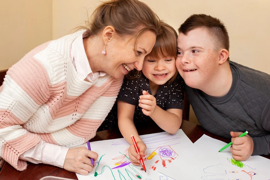 ”síndrome-down-ayudas-beneficios-niños-discapacidad-prestaciones-economicas-madres”